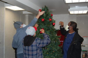 Patients decorating Christmas tree